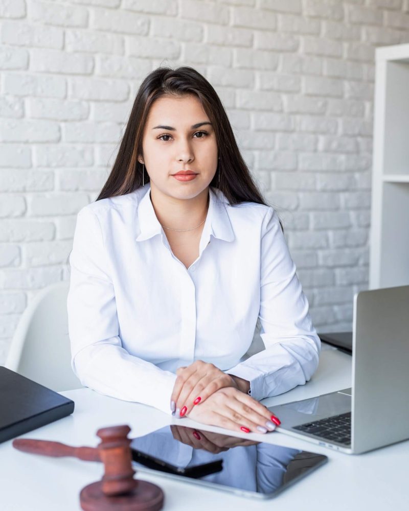 portrait-of-young-female-lawyer-at-her-workplace-1.jpg